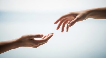 Gentle gesture of hands reaching towards connection and support