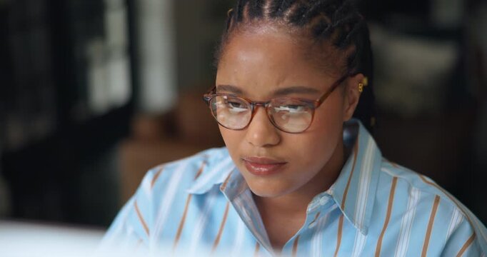 Remote work from home, glasses and black woman with computer, reading and copywriting. African person, eyewear and freelancer with internet, magazine editor and research for article and optometry