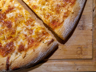 casual dining setting showcasing flavorful pizza slices with oregano and golden crust details