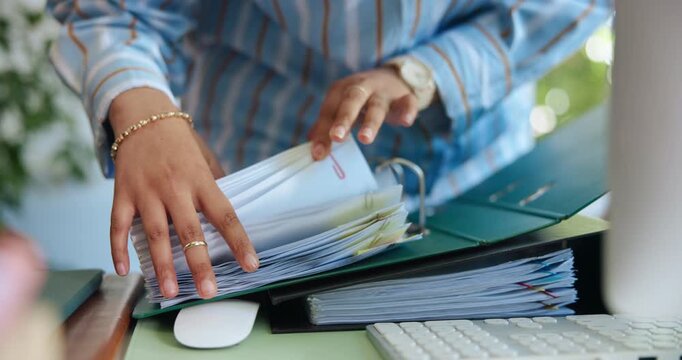 Business person, hands and checking folder with documents for administration or backlog in office. Closeup, employee or administrator searching with files or paperwork for company report in workplace