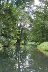 Obraz premium Idyllic river in the Spreewald with reflections in the clear water