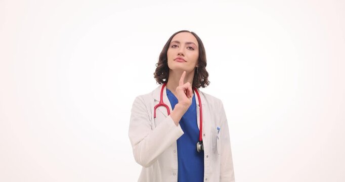 A medical expert in a white coat offers valuable health tips, pointing with enthusiasm and clarity. This engaging session promotes wellness practices for a healthier lifestyle.