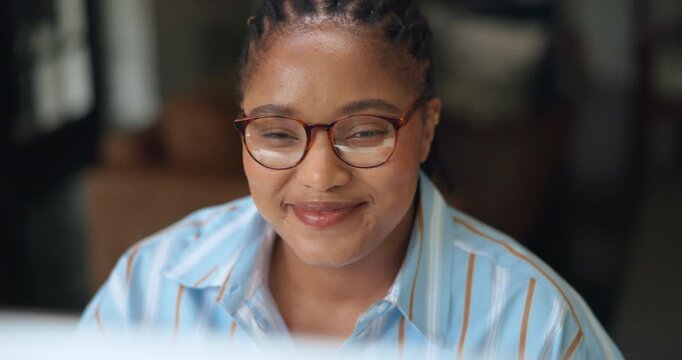 African woman, reading and computer with smile for feedback, information and article post. Person, remote work and glasses with pc for proofreading report, update draft and story publication at house