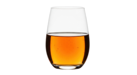 Isolated stemmed glass of amber drink with golden hue, reflecting light beautifully.