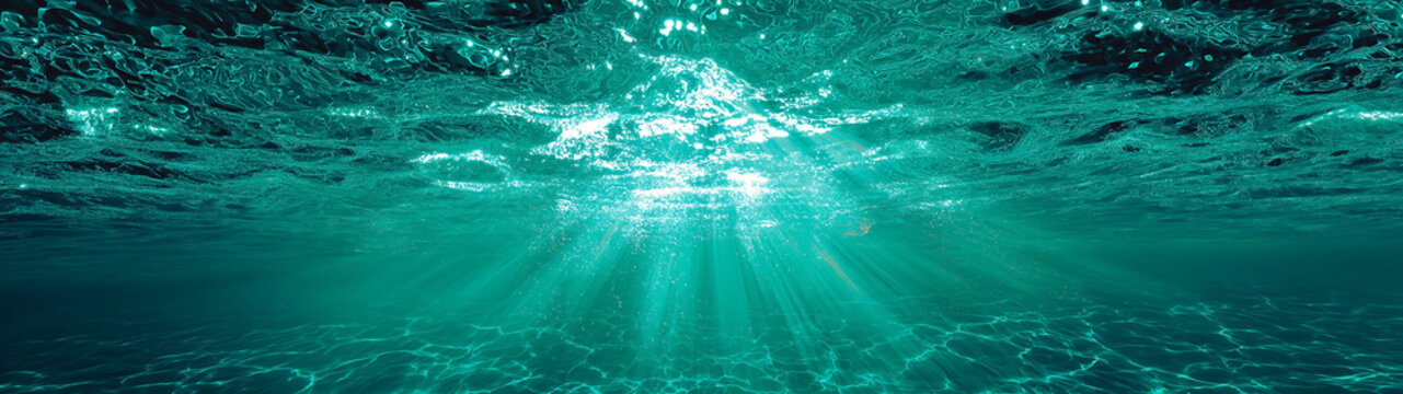 Close underwater view with shimmering aqua light, sun rays, crystal-clear water, and detailed caustics