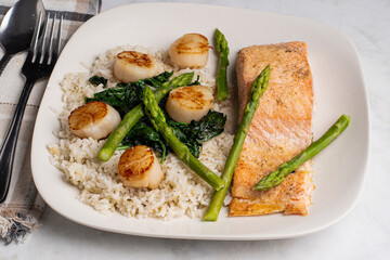 baked salmon   with scallops  and rice