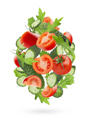 Fresh vegetable salad ingredients - red tomato, green cucumbers, leafy greens fly as art swirl composition, isolated. Summer healthy eating, organic food for advertising, design, branding product.