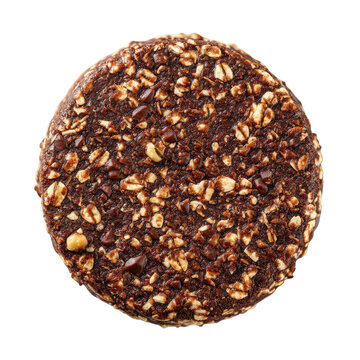 Round, dark oatcake with grainy texture, against a stark black backdrop