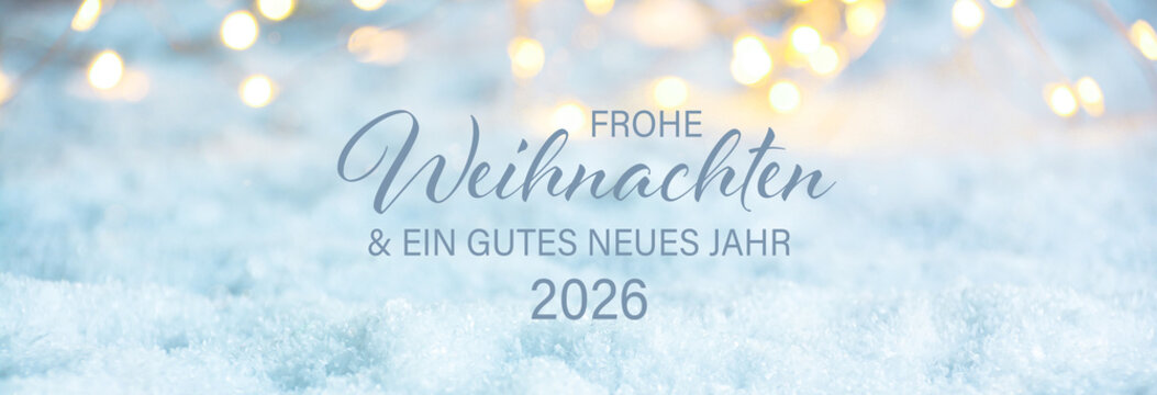 Abstract blue winter background with snow texture and blurred bokeh light  - Christmas greeting card with German text - Frohe Weihnachten und ein gutes neues Jahr 2026