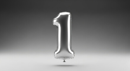 Shiny silver number one balloon floating on a neutral gray background
