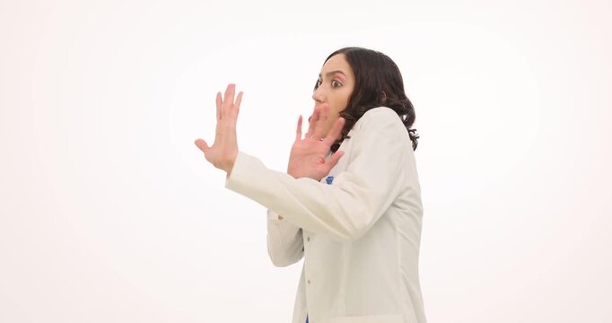 A doctor expresses a range of emotions as they encounter a surprising situation in the clinic. The reactions shift from shock to disbelief, highlighting their genuine surprise.