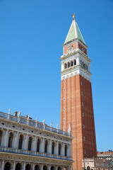 Red brick tower known as Campanile, St. Mark's Square in Venice.