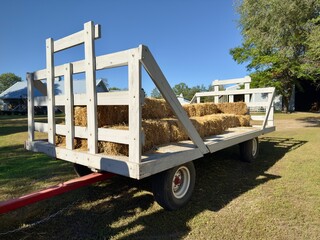 wooden wagon stack with hay