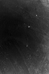 Fototapeta premium Cinematic Dust and Scratches Texture. Moody Abstract Black Background with Light Vintage Film Effect.