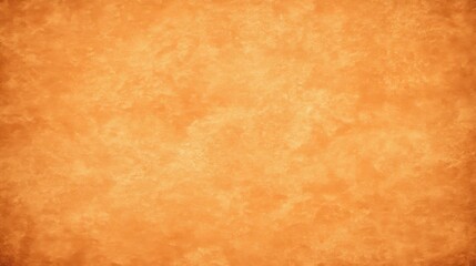 Fototapeta premium Warm orange textured background with a subtle vignette effect, featuring a grainy, rough surface ideal for abstract designs, blurred orange background