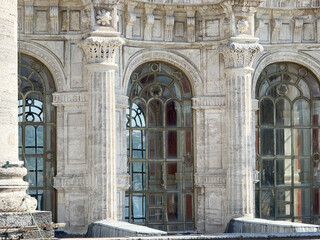 Ornate window and column details of the historic Ortakoy Mosque on the Bosphorus waterfront