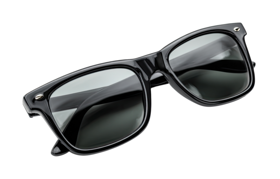 Close-up of black sunglasses with square frames.  The lenses are a dark gray or smoky tint, and the frames are glossy black plastic.  The sunglasses are angled, showing both the front and sides