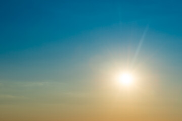 Big shining sun on sunset sky, sunset sky with sun light background