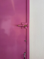 pink door with white wall