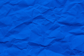 Macro crumpled blue paper background,Abstract light blue paper texture background. Texture of crumpled craft paper. Paper background. Recycled blue paper backdrop in close up. sky blue Textures.