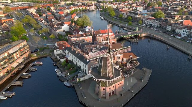 Windmill De Adriaan, since 1779. Old Windmill from the 18th century in Haarlem, Netherlands. Aerial View at Sunset time