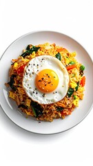 Fried rice topped with egg on white plate