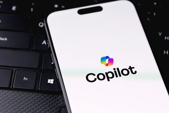 Microsoft Copilot logo mobile app on a screen smartphone iPhone. Microsoft Copilot is an artificial intelligence assistant for Microsoft 365 apps and services. Batumi, Georgia - September 7, 2025