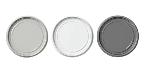 Overhead shot showcasing three metallic circular container lids with varied shades on a black background