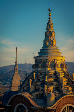 Turin. From the top of the Cathedral's bell tower, the Holy Shroud Chapel's dome and the iconic Mole Antonelliana.