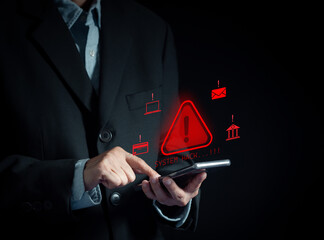 Businessman holds a smartphone with a red warning triangle and "System Hack" alert. Concept of cybersecurity threat, malware, data breach, phishing scam, financial fraud, and network security risk.