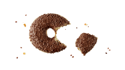 Dark chocolate glazed donut with creme filled and crumbs flying falling isolated on white background.