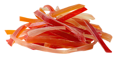 A close-up shot of a pile of vibrant, multi-colored fruit strips against a black background