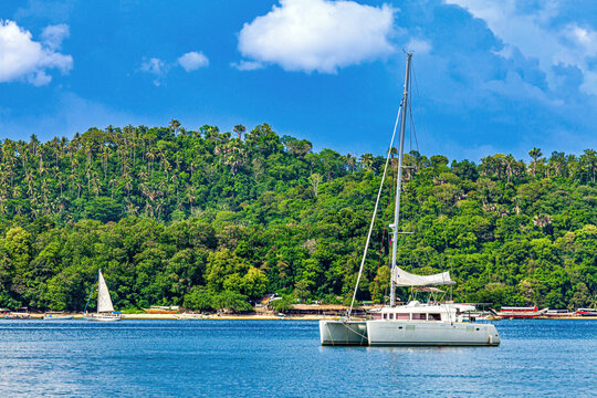 Catamaran anchored off the coast of Puerto Galera, Mindoro, Philippines
