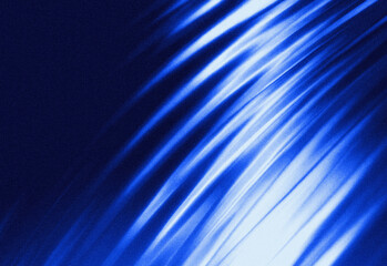 Abstract blue light streaks sweeping across a dark gradient, conveying motion and energy for futuristic technology visuals suitable for creative, commercial digital media projects