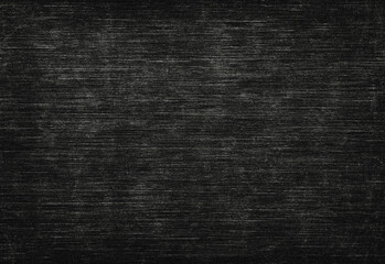 Dark textured surface resembling a worn chalkboard or slate with subtle scratches and grain, ideal as a versatile background for graphic design, presentations, creative layouts
