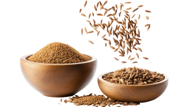 Two wooden bowls filled with cumin seeds and falling cumin seeds isolated on transparent background