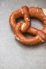 Delicious traditional Bavarian Brezeln or pretzels with a brown salty crust. German Pretzel Brezel. Food on Oktoberfest