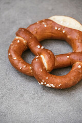 Delicious traditional Bavarian Brezeln or pretzels with a brown salty crust. German Pretzel Brezel. Food on Oktoberfest