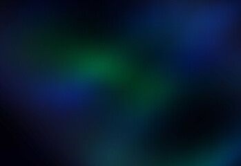 Softly blurred abstract gradient background with deep blue and emerald green hues blending to create a moody atmospheric backdrop for designs, presentations, and branding