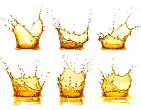 Golden liquid splashes frozen in motion, droplets suspended mid-air