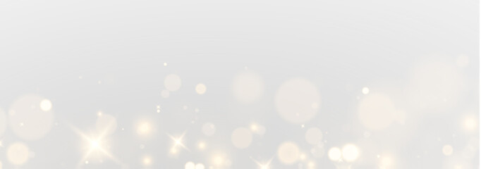 Glowing golden Christmas flare with magical glittering dust and soft festive light forming a luxurious holiday illustration with isolated sparkling effects in a fantasy atmosphere