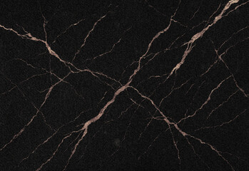 Close-up of polished black marble with dramatic gold veining, highlighting luxury natural stone texture for premium countertops, backsplashes, and modern interior design projects