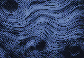 Abstract blue textured pattern with flowing wavy lines and circular swirls, close up view of a grainy surface in deep navy tones with subtle speckled highlights for graphic design