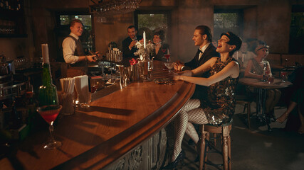 Vintage bar moment with laughing guests and bartender mixing drinks. Concept of cocktail bar advertising, mixology festival promo, nightlife SMM content, premium alcohol marketing, event posters.