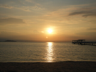 Evening sun set with shade of evening orange sun light and clouded sky background