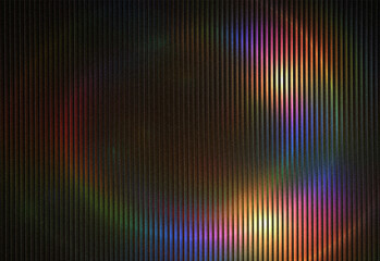 Fototapeta premium Abstract colorful light reflections on a textured dark surface featuring vertical lines and soft rainbow gradients, creating a moody, modern visual ideal for creative campaigns