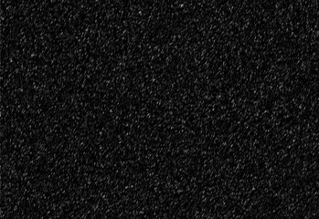 Fototapeta premium Close up of a black textured surface with fine grain and subtle glittering specks, offering an elegant background for product photography, design layouts, and branding