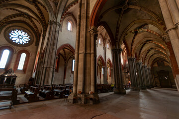 Fototapeta premium Vercelli, Piedmont, Italy. The gothic Saint Andrew, the cloister and the annexed Abbey.