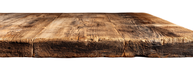 Close-up view of a rustic wooden table top.  Wooden planks run horizontally across the image, showing varied shades of brown and hints of darker grain.  