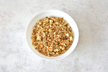Healthy Breakfast Granola in White Bowl top view